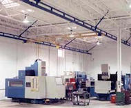 Ceiling supported bridge cranes are for sale at AMCHoist. Ceiling supported bridge crane set up in a warehouse for transporting heavy materials.